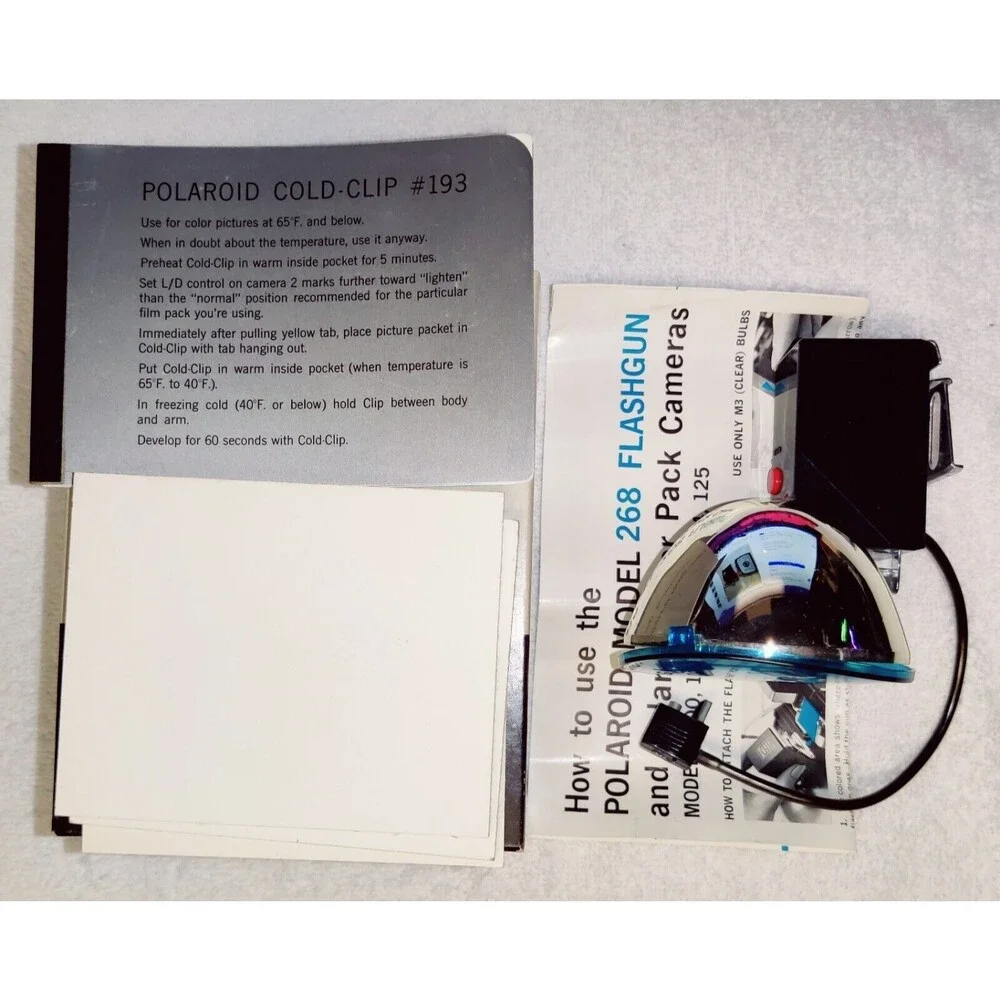 VINTAGE POLAROID FLASHGUN #268 WITH BOX AND MOUNTING POINTS & CLIP